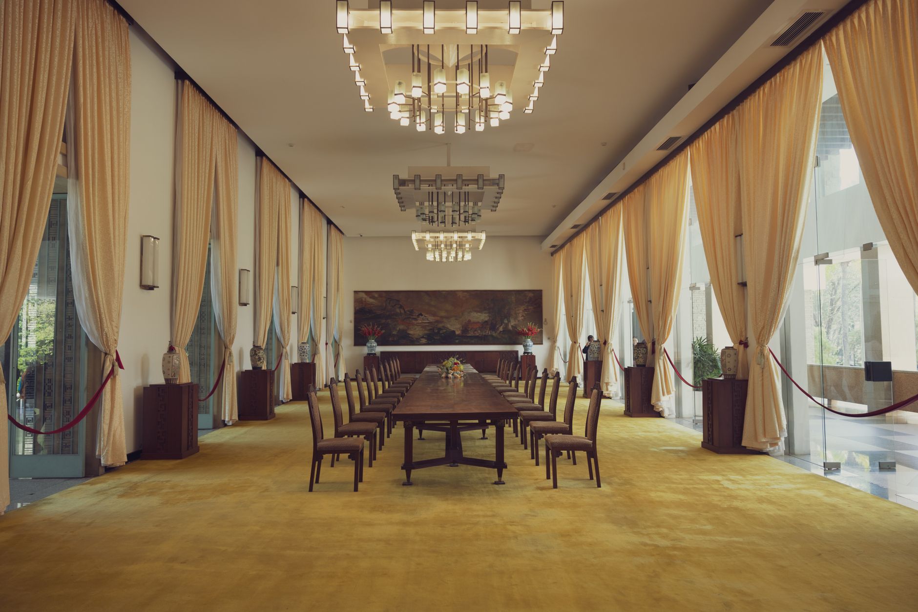 Two world leaders seated at a formal diplomatic table during a bilateral meeting
