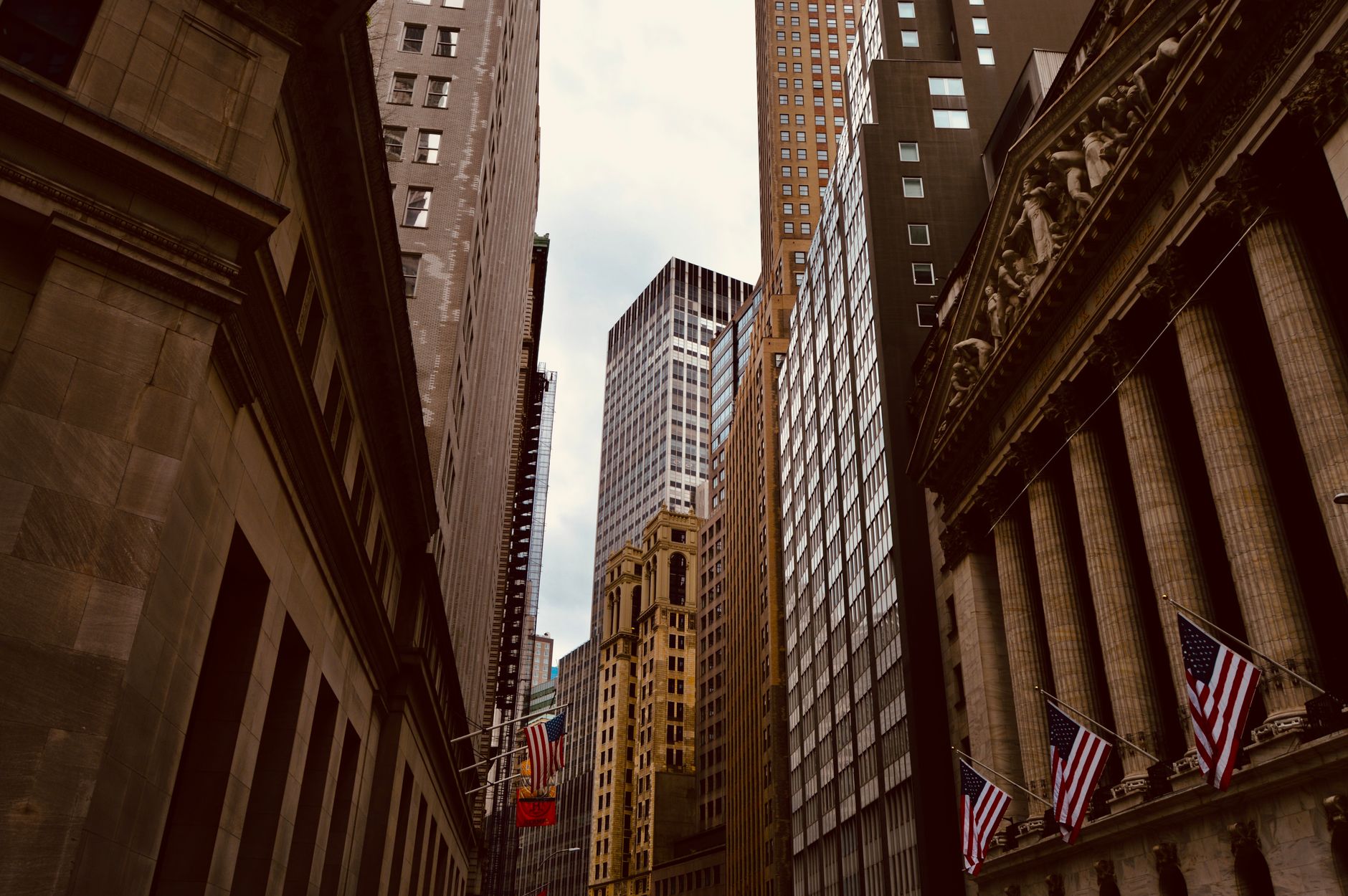 Exterior view of a Wall Street financial district building representing major investment bank activity