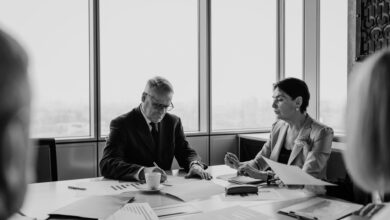 Financial advisor meeting with client in a modern wealth management office