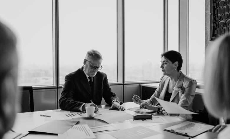 Financial advisor meeting with client in a modern wealth management office