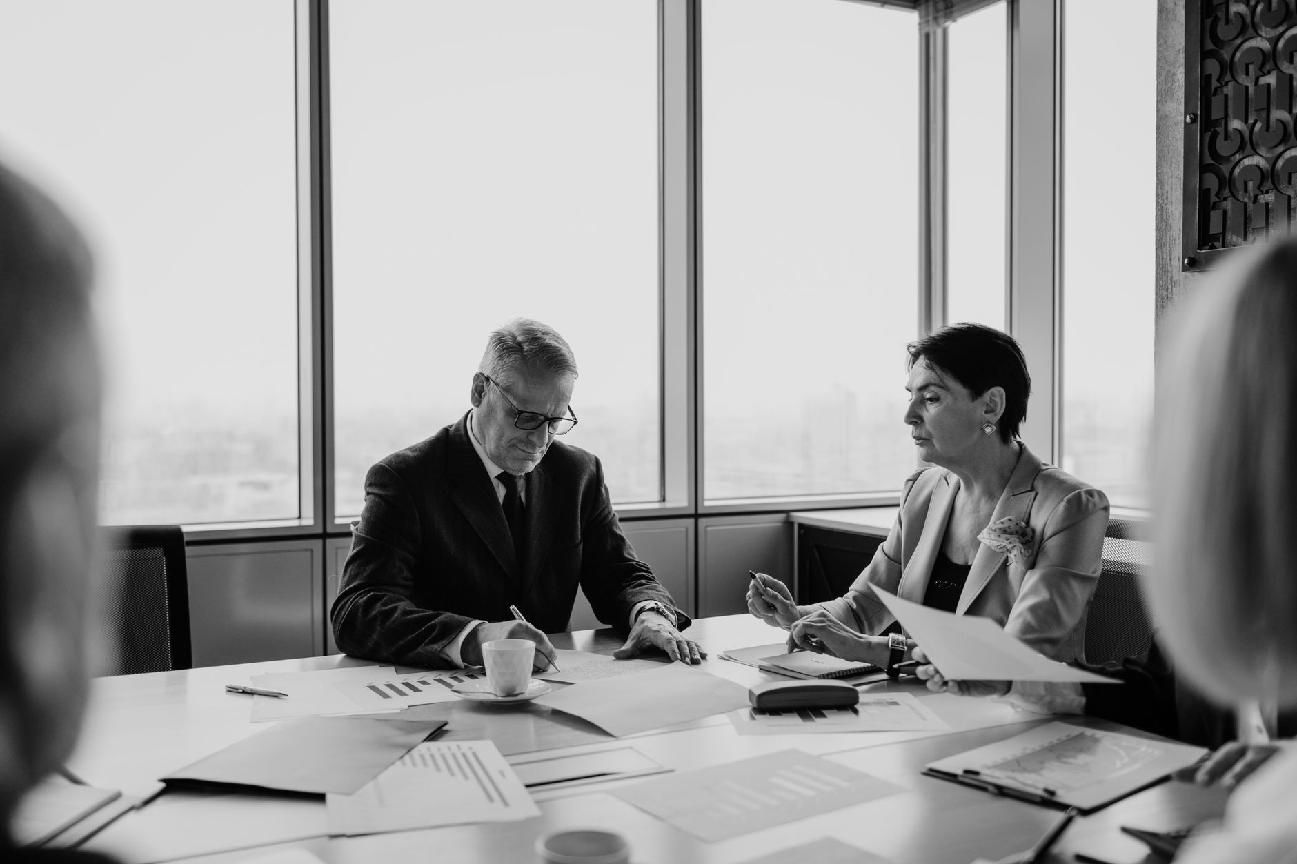 Financial advisor meeting with client in a modern wealth management office