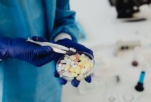 Scientist working in a pharmaceutical research laboratory with medical equipment