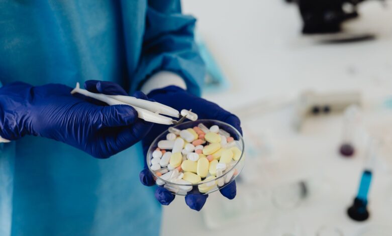 Scientist working in a pharmaceutical research laboratory with medical equipment