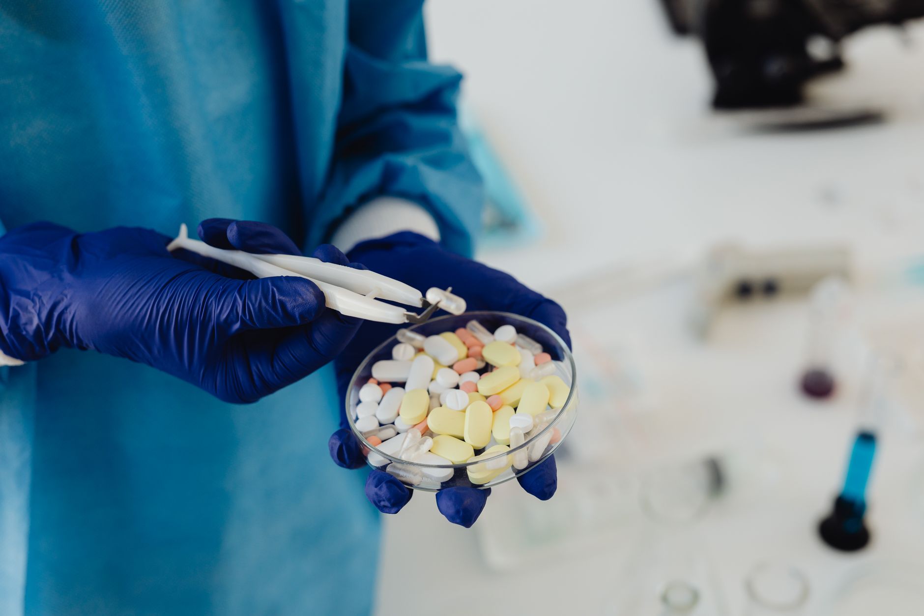 Scientist working in a pharmaceutical research laboratory with medical equipment