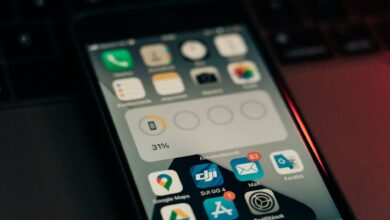 Person browsing app store on a smartphone screen