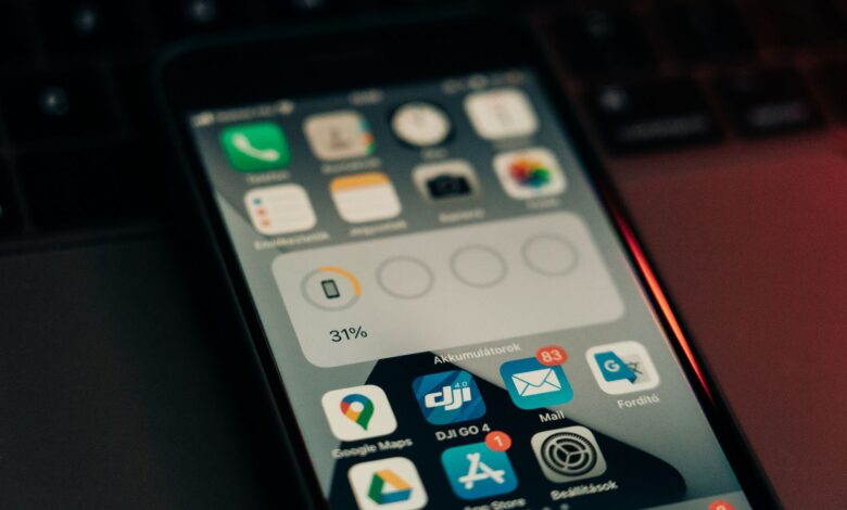 Person browsing app store on a smartphone screen