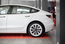 Modern electric vehicle on display inside a car showroom
