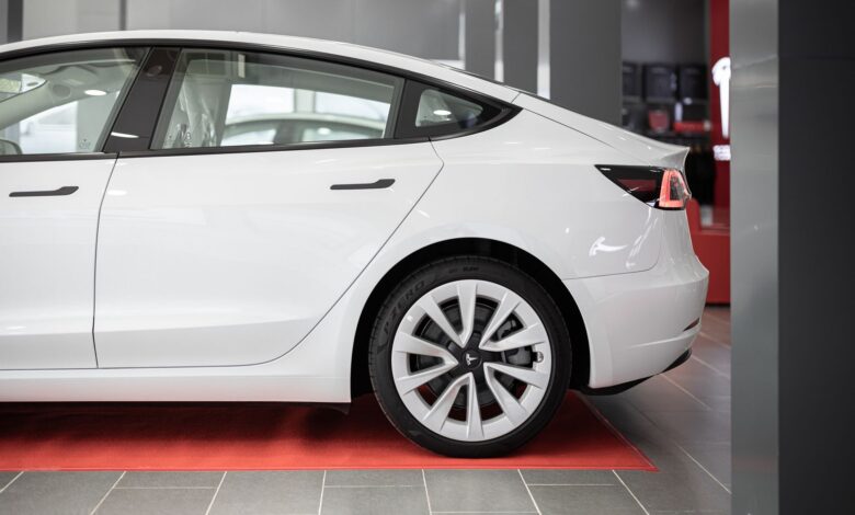 Modern electric vehicle on display inside a car showroom