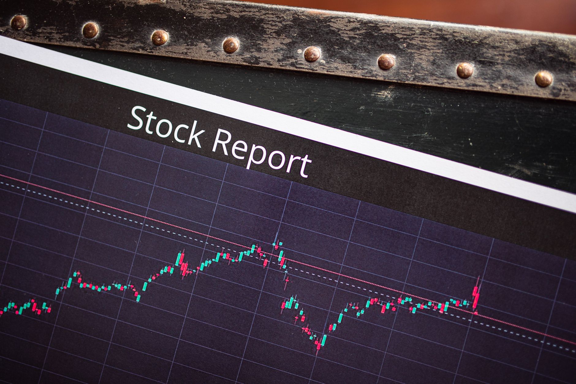 Financial charts and data screens showing credit market activity and interest rate trends