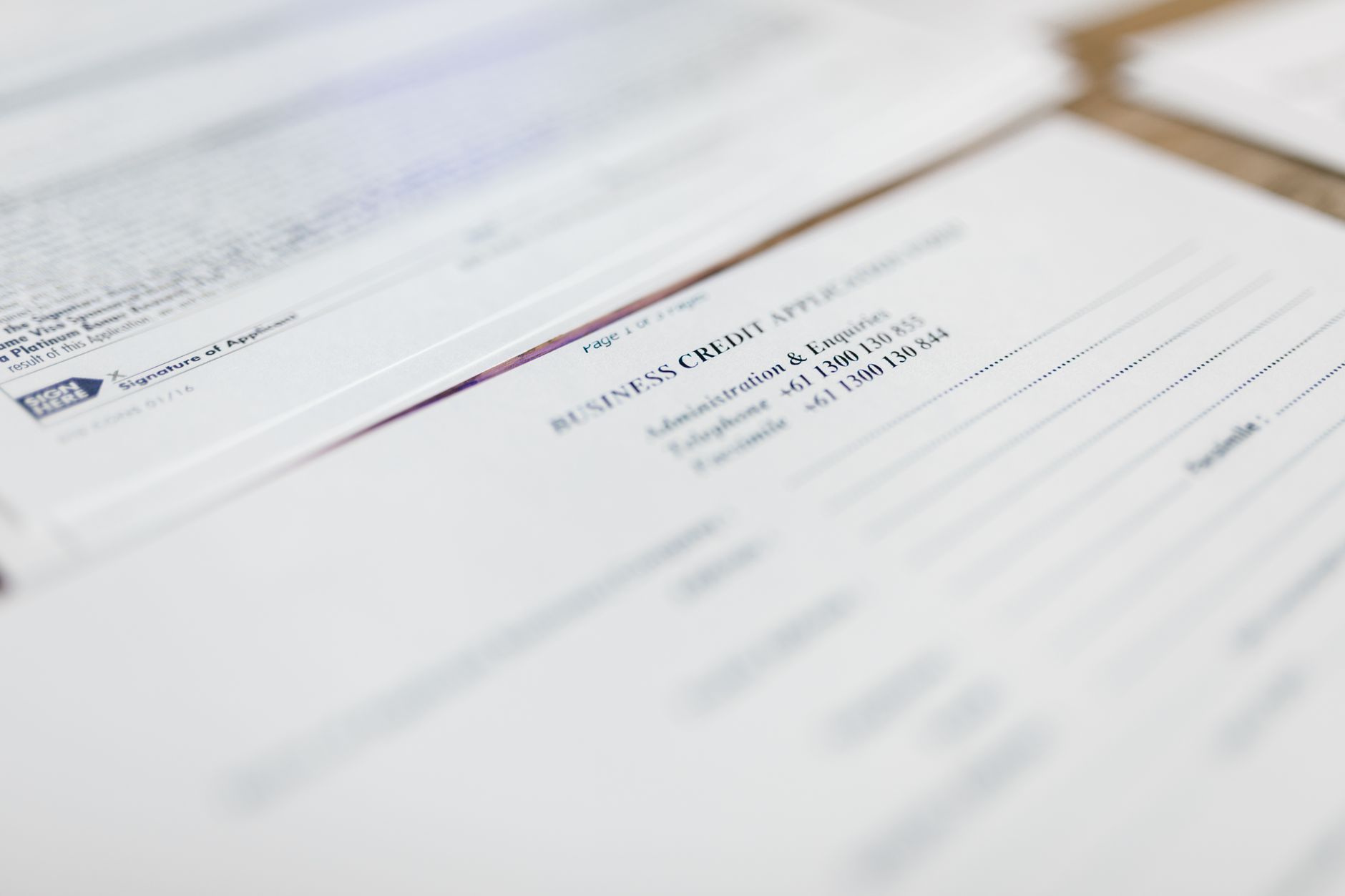 Financial documents and charts on a desk representing private credit deal structuring