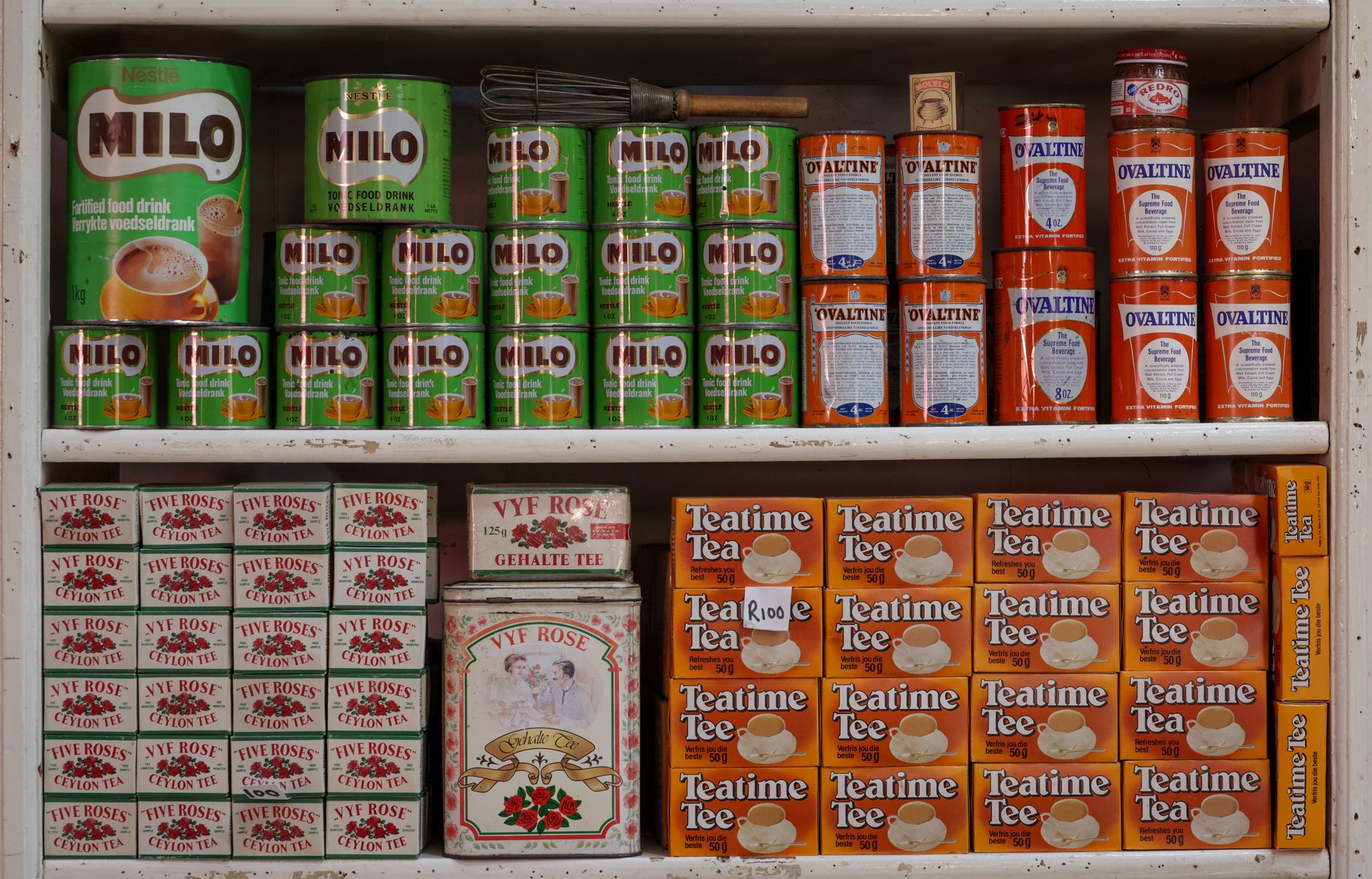 Various packaged food and beverage products arranged on a display surface