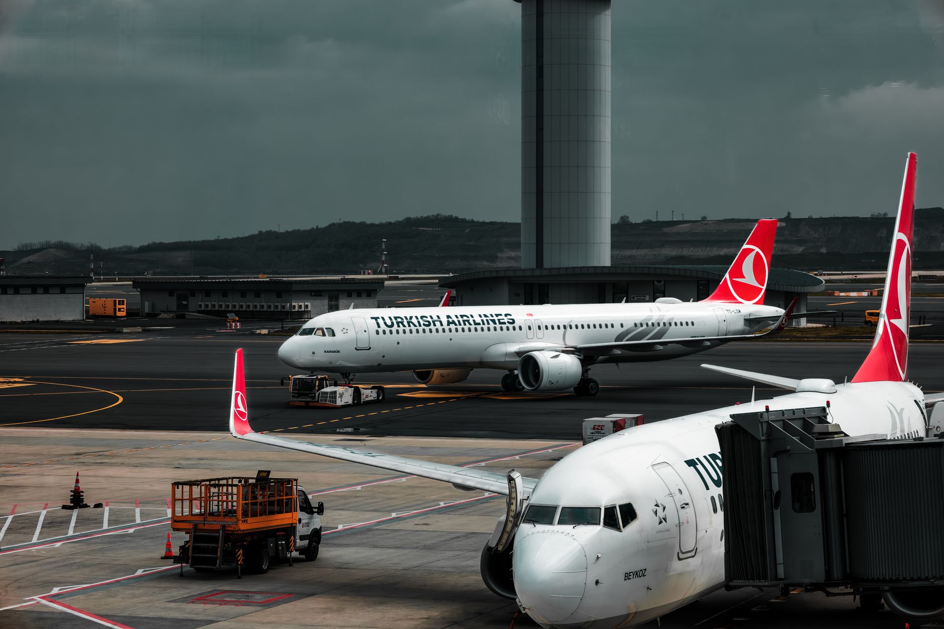 Passengers waiting in an airport terminal at a low-cost carrier gate