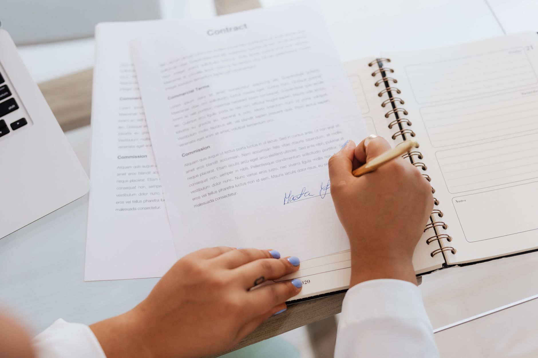 Business professionals reviewing legal documents representing OpenAI's nonprofit conversion process