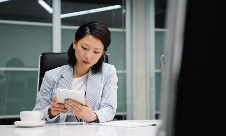 Modern corporate office with employees working on computers representing enterprise AI adoption