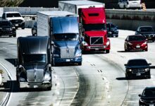 Semi-truck driving on a highway representing the digital freight brokerage market