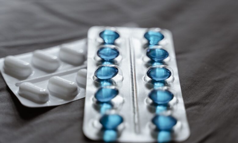 Close-up of prescription medication bottles representing pharmaceutical patent disputes