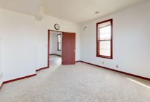 A furnished apartment living room representing long-term Airbnb rental accommodations