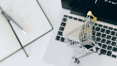 Person browsing an online shopping platform on a laptop, representing digital retail advertising