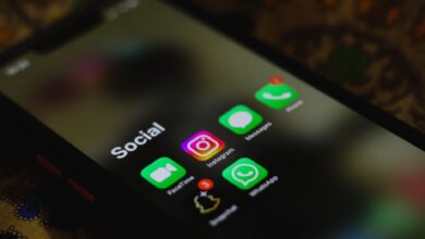 Person scrolling through a social media app on a smartphone