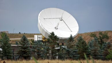 A satellite dish installed at a remote rural property representing internet connectivity in underserved areas