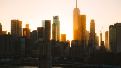Glass skyscrapers in a major financial district representing corporate finance and IPO markets