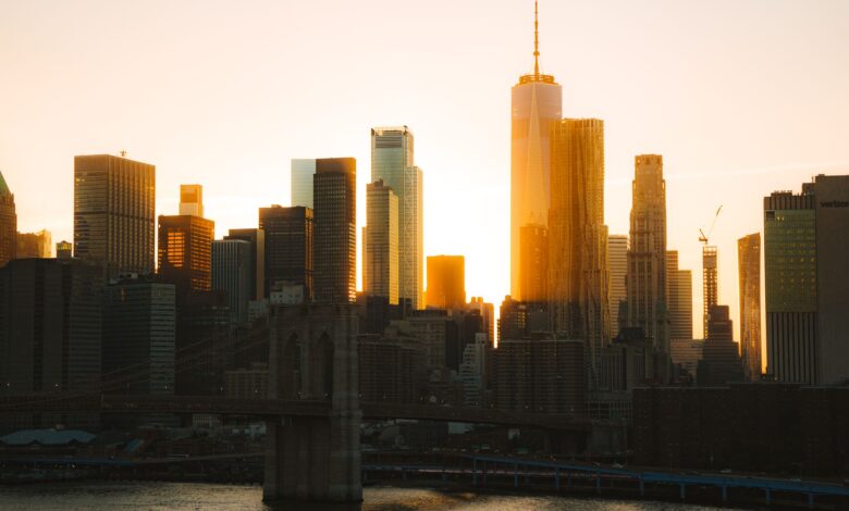 Glass skyscrapers in a major financial district representing corporate finance and IPO markets