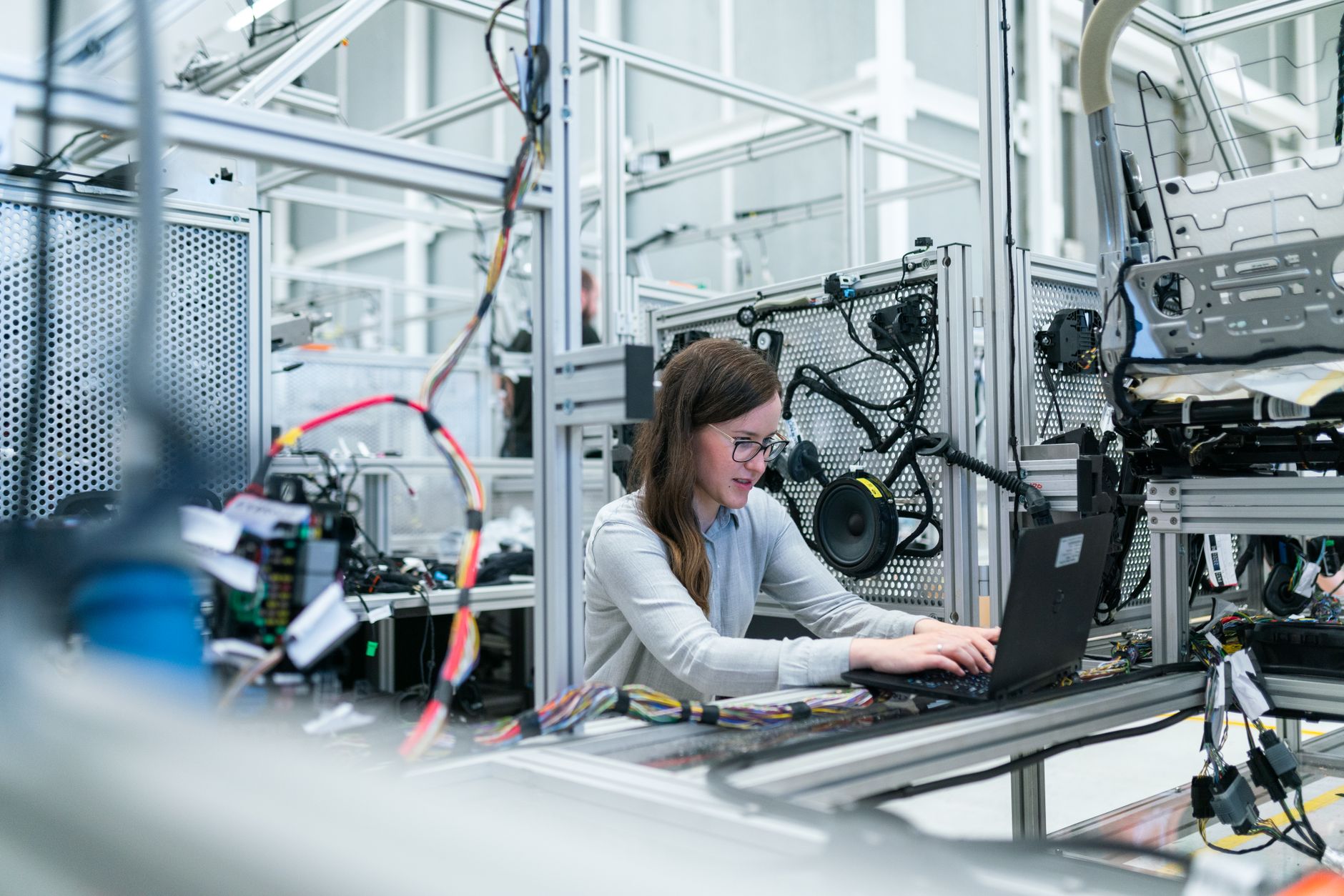 Engineer working at a computer in a semiconductor design environment