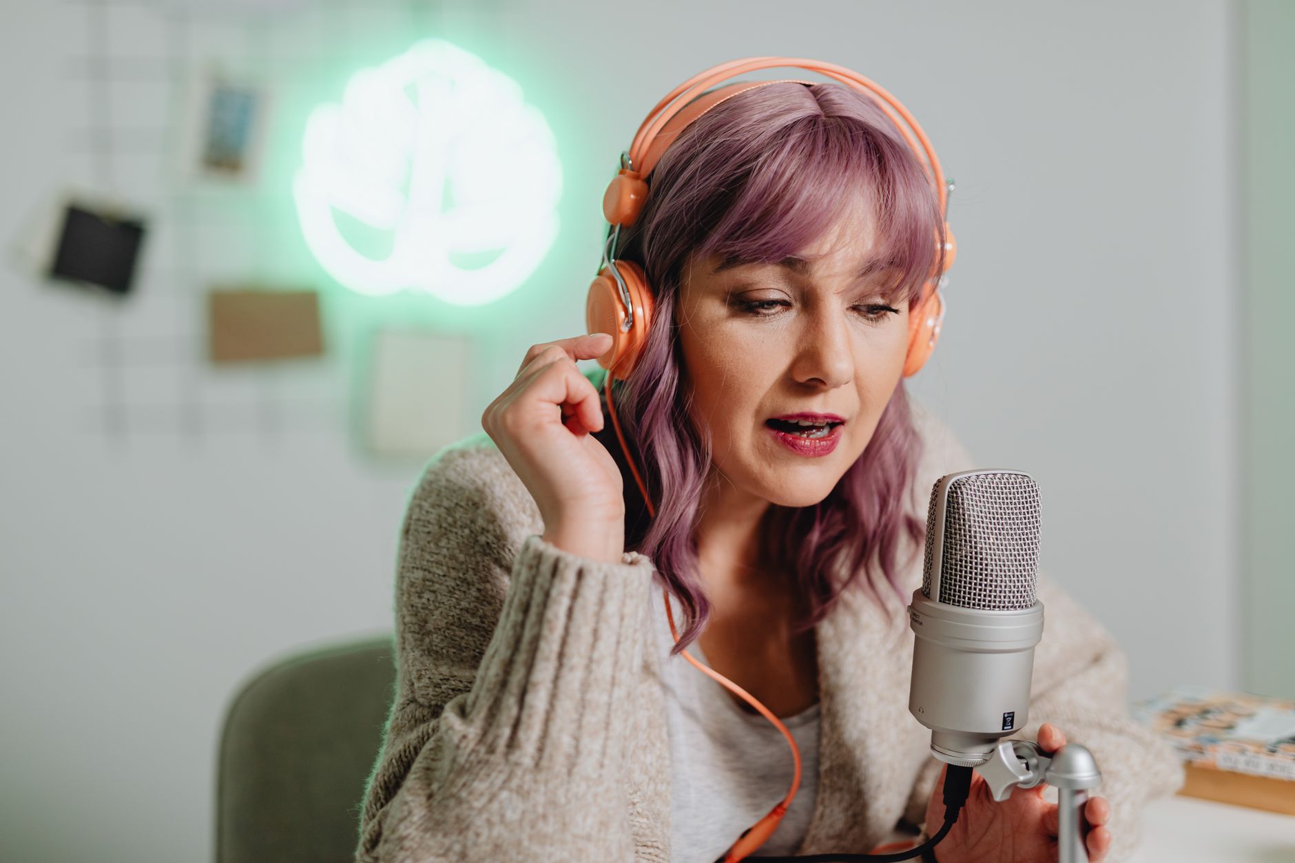 Person listening to audio streaming content on headphones