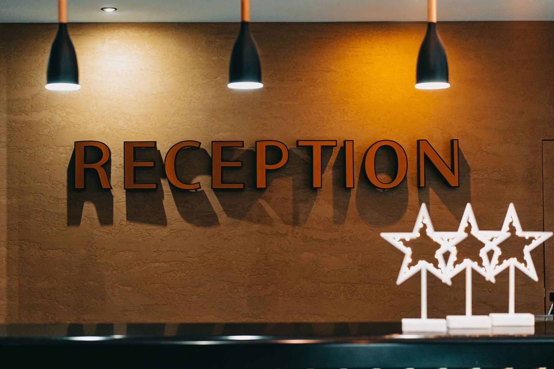 An empty hotel lobby illustrating reduced occupancy pressure facing the traditional hospitality industry