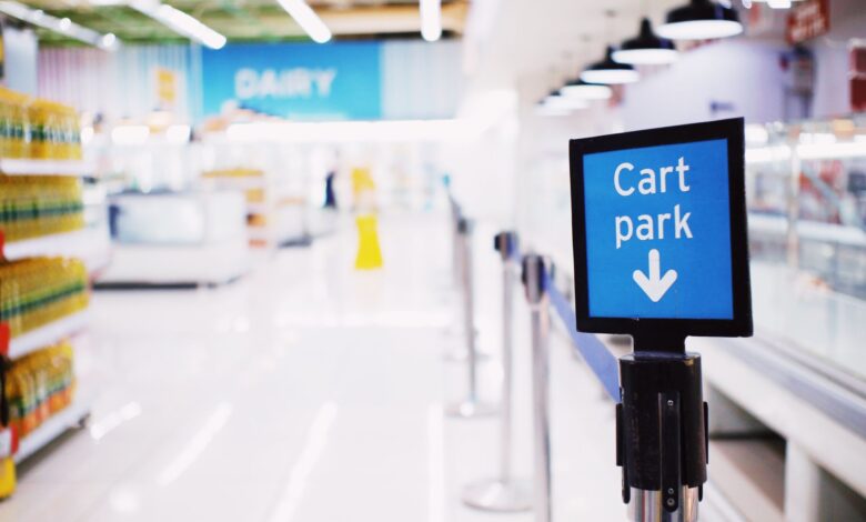 Wide retail store aisle with product shelves representing Walmart's physical store advertising advantage