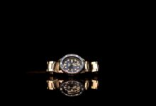 Close-up of a luxury mechanical watch face showing intricate dial detailing