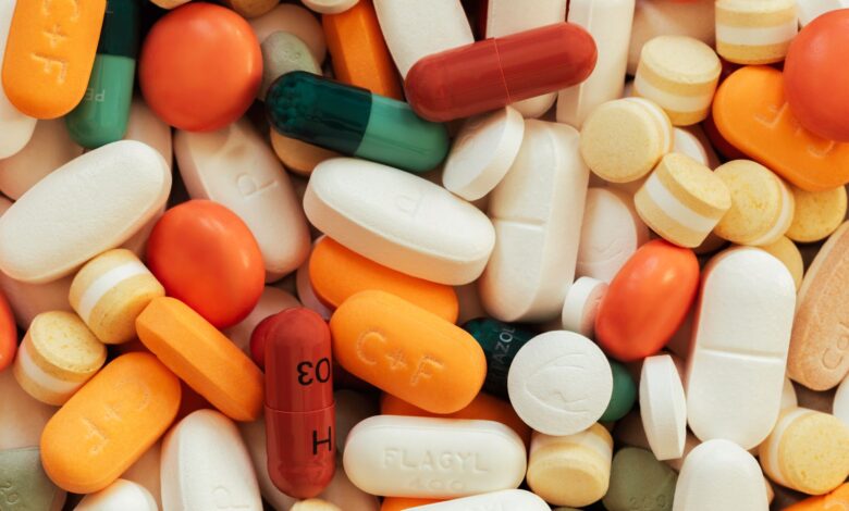 Close-up of prescription medication pills representing the GLP-1 weight loss drug market