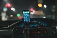 A self-driving autonomous vehicle on a city street representing Waymo's robotaxi expansion