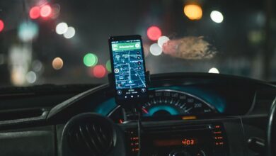 A self-driving autonomous vehicle on a city street representing Waymo's robotaxi expansion