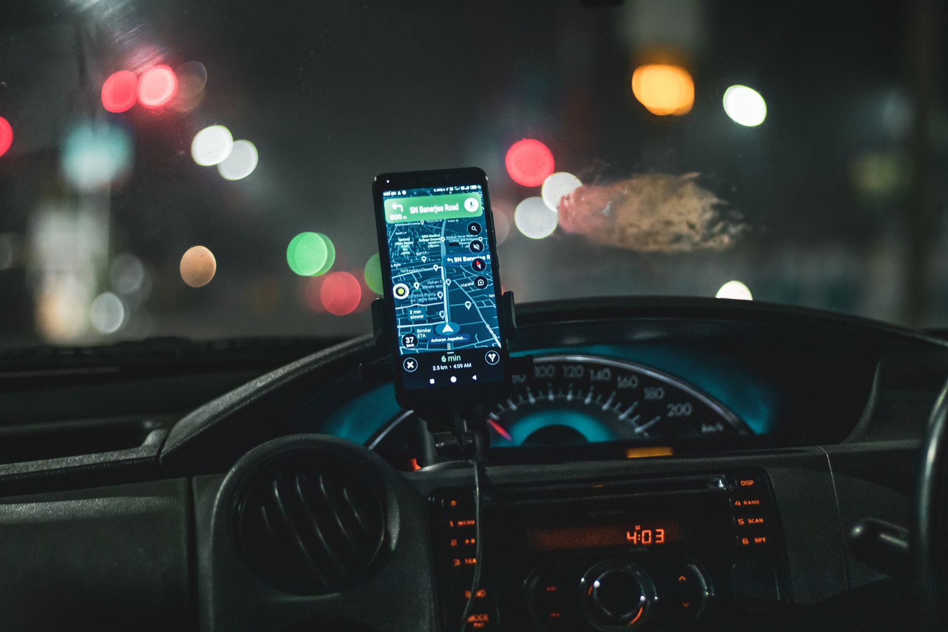 A self-driving autonomous vehicle on a city street representing Waymo's robotaxi expansion