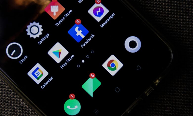 Person browsing a mobile app store on a smartphone
