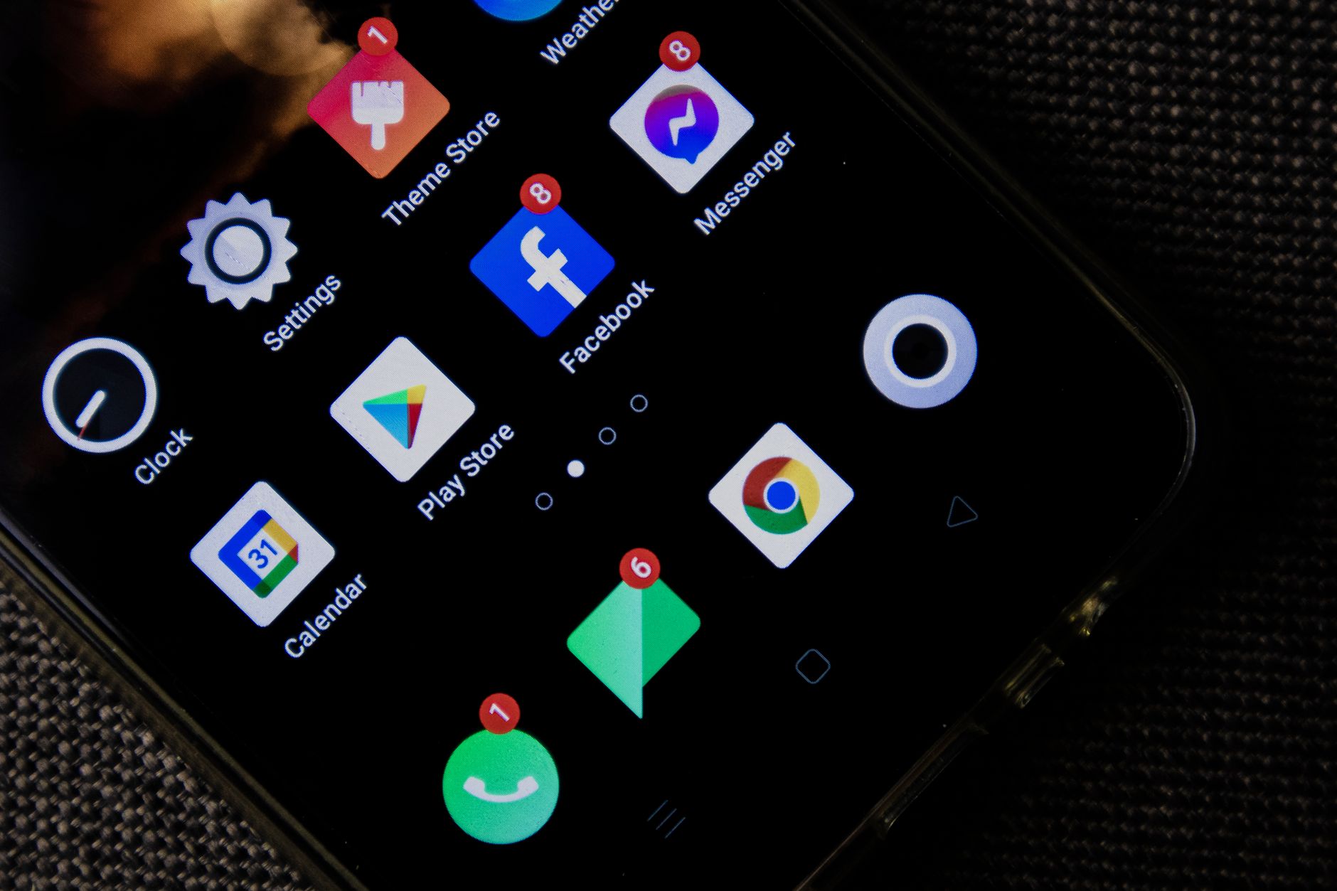 Person browsing a mobile app store on a smartphone