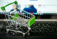 Person browsing products on a laptop screen representing online retail search behavior