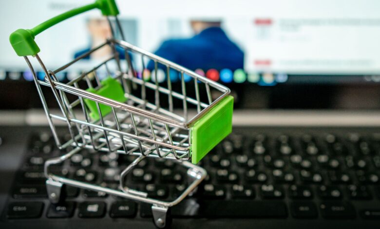 Person browsing products on a laptop screen representing online retail search behavior