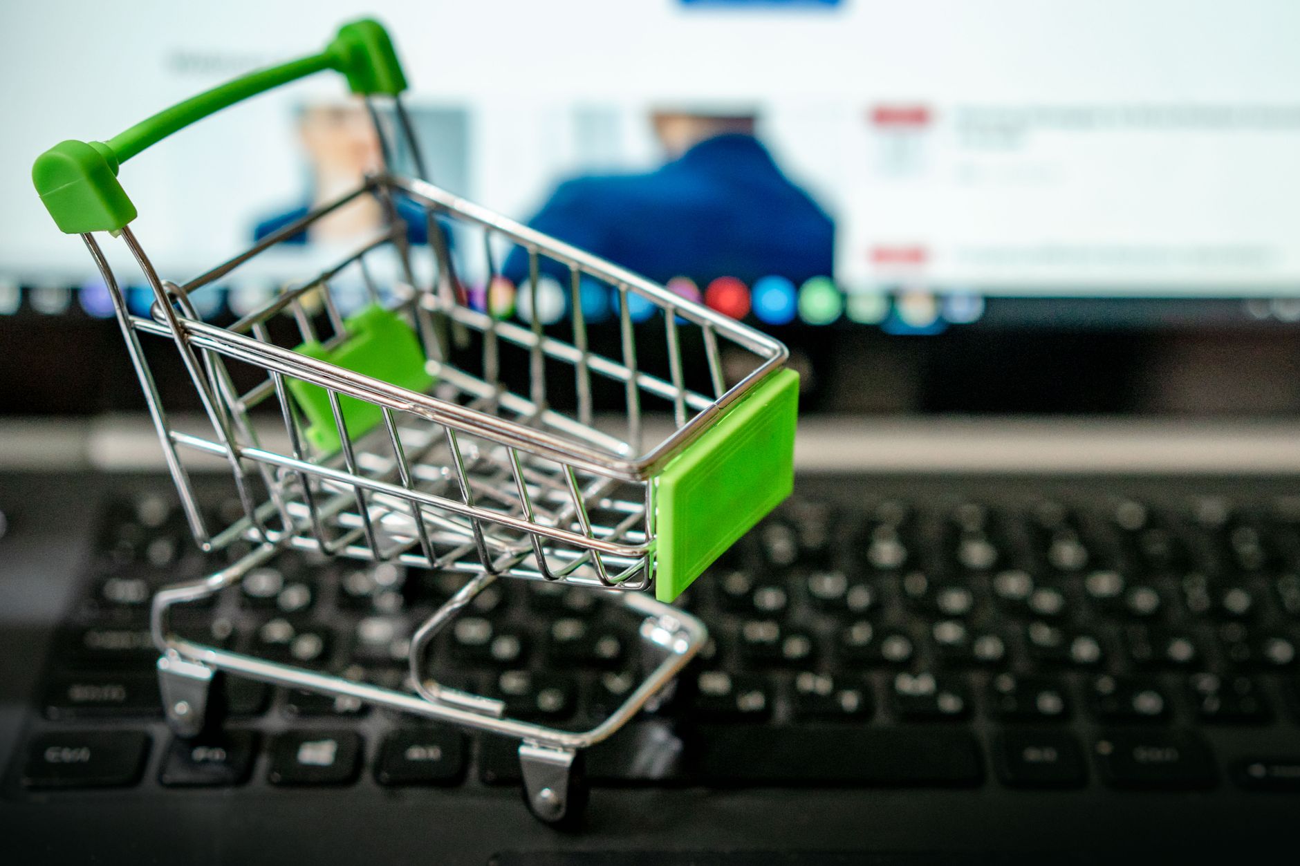 Person browsing products on a laptop screen representing online retail search behavior
