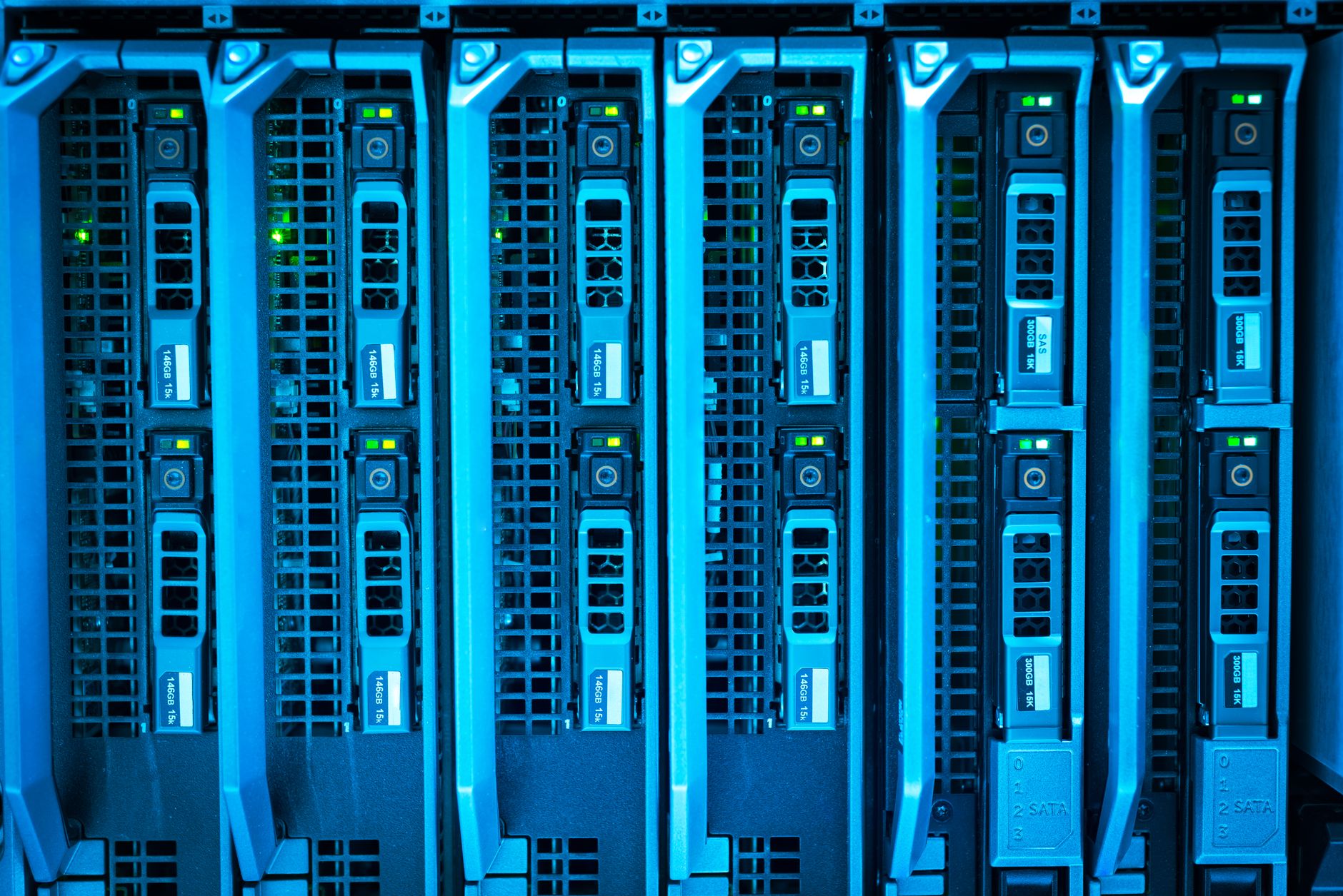 Rows of servers inside a modern data center facility