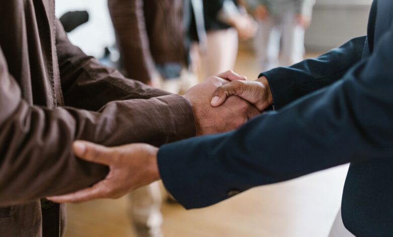 Business professionals in a formal meeting discussing investment portfolio strategy
