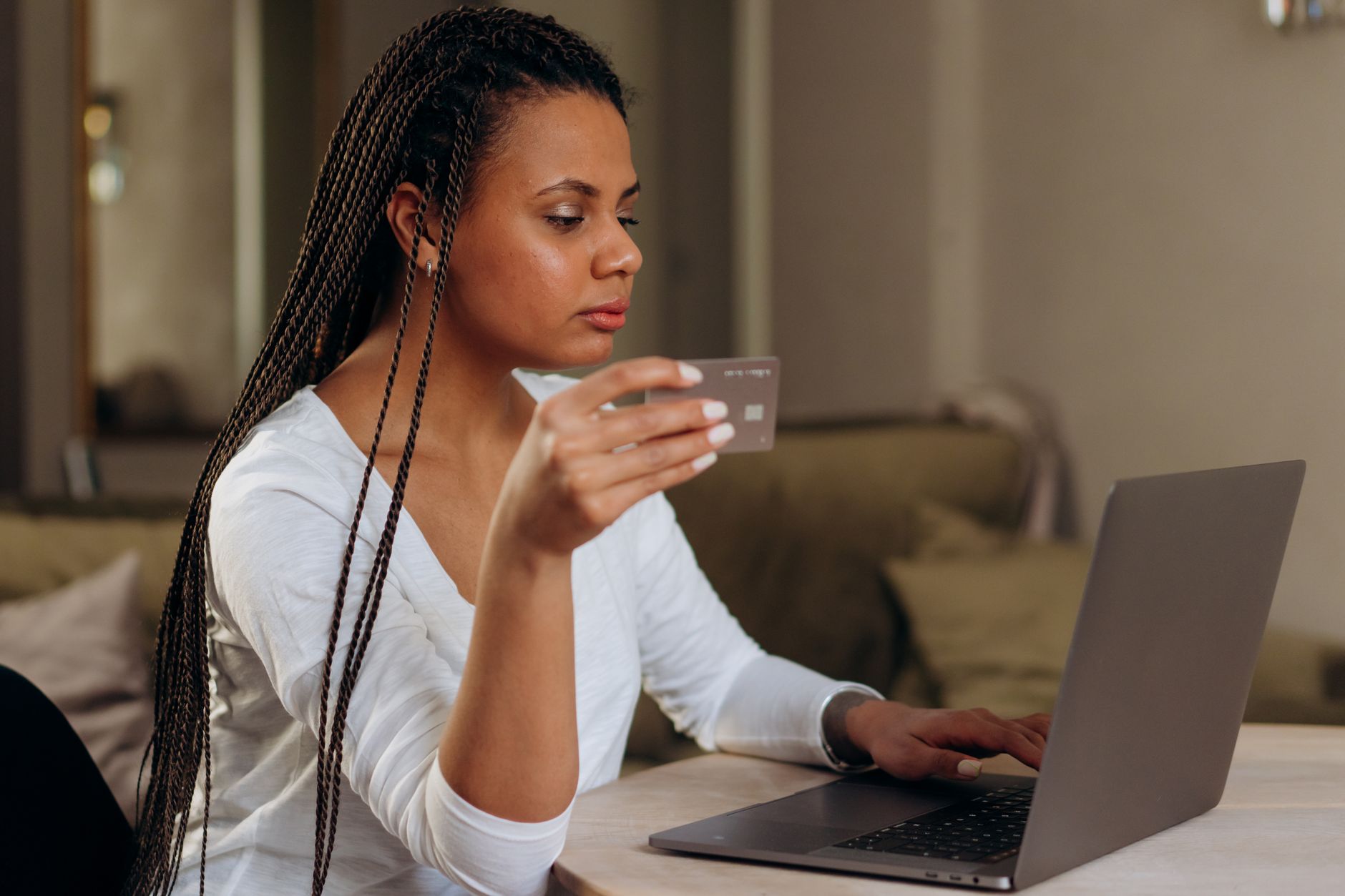 Person completing an online purchase at checkout using a buy now pay later option