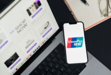 Close-up of a smartphone displaying a digital payment interface at checkout