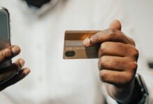 Person using a smartphone to make a digital payment transaction