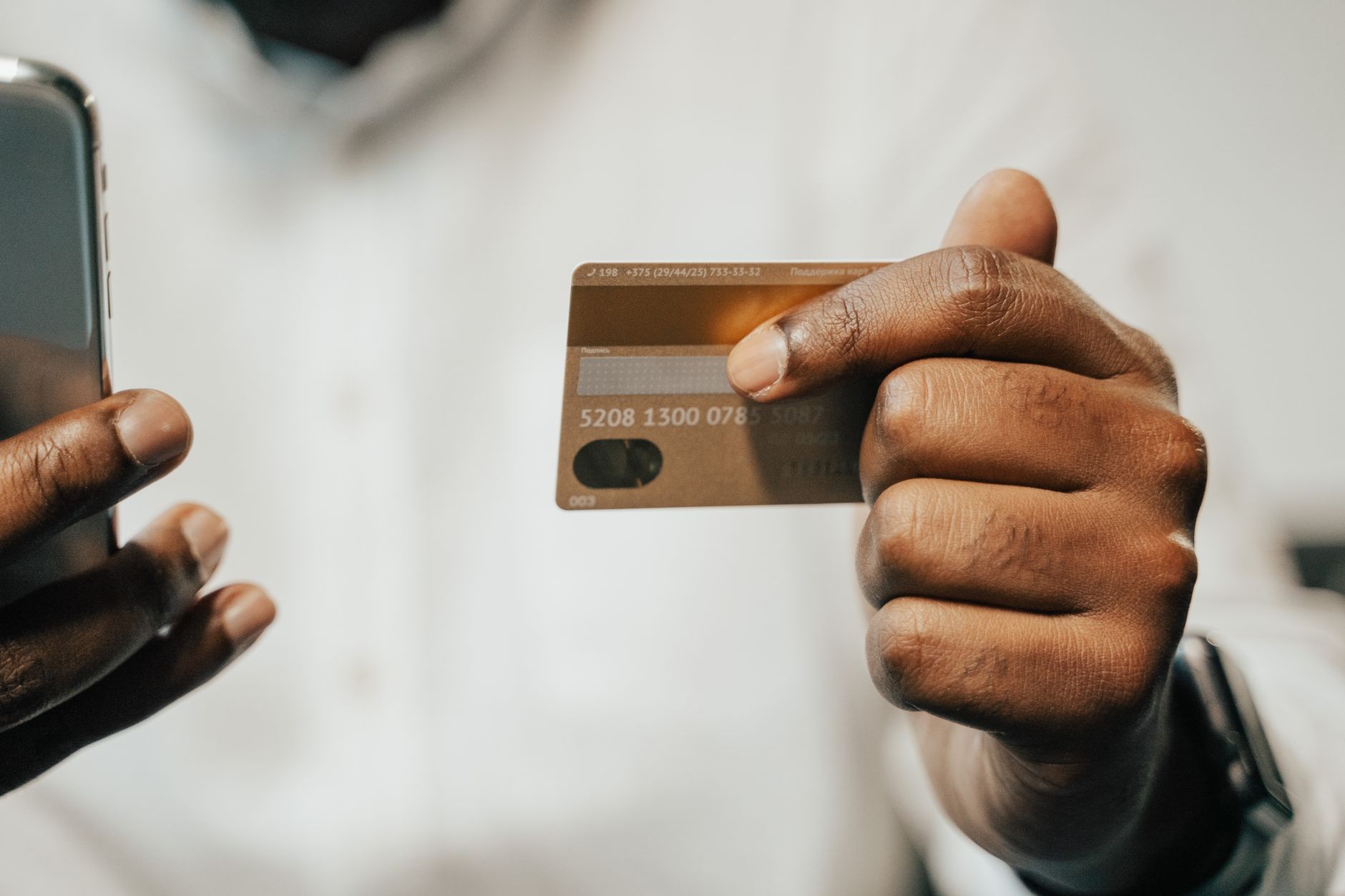 Person using a smartphone to make a digital payment transaction