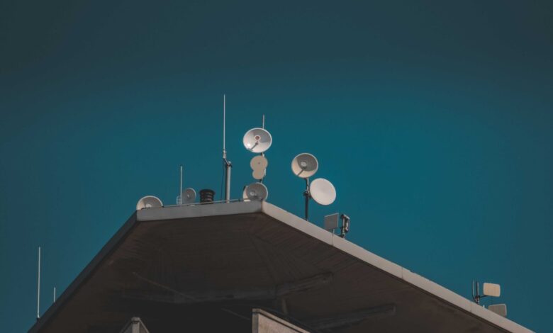 A satellite dish installed in a rural area representing remote internet connectivity options