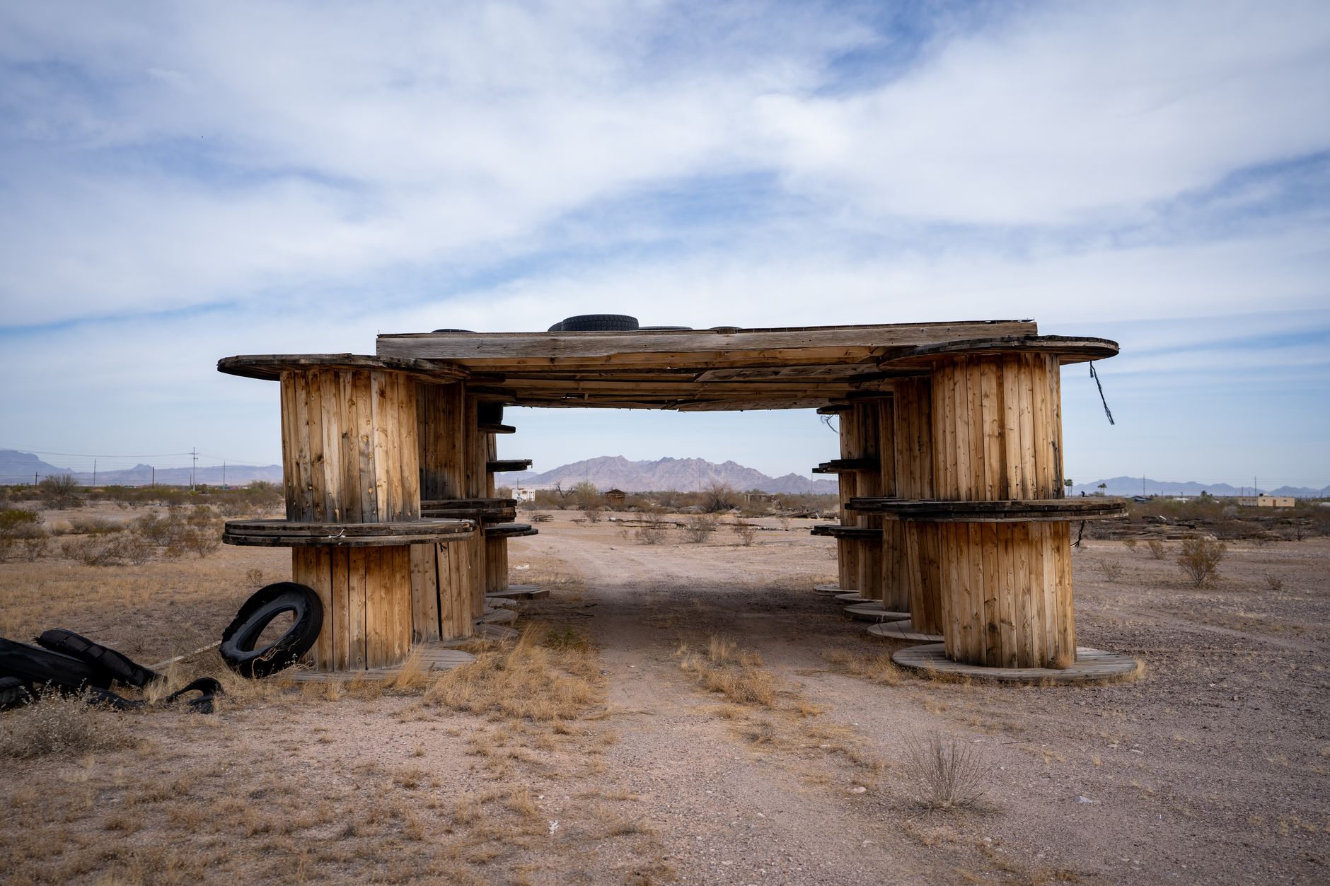 Large-scale industrial construction site in an arid desert landscape
