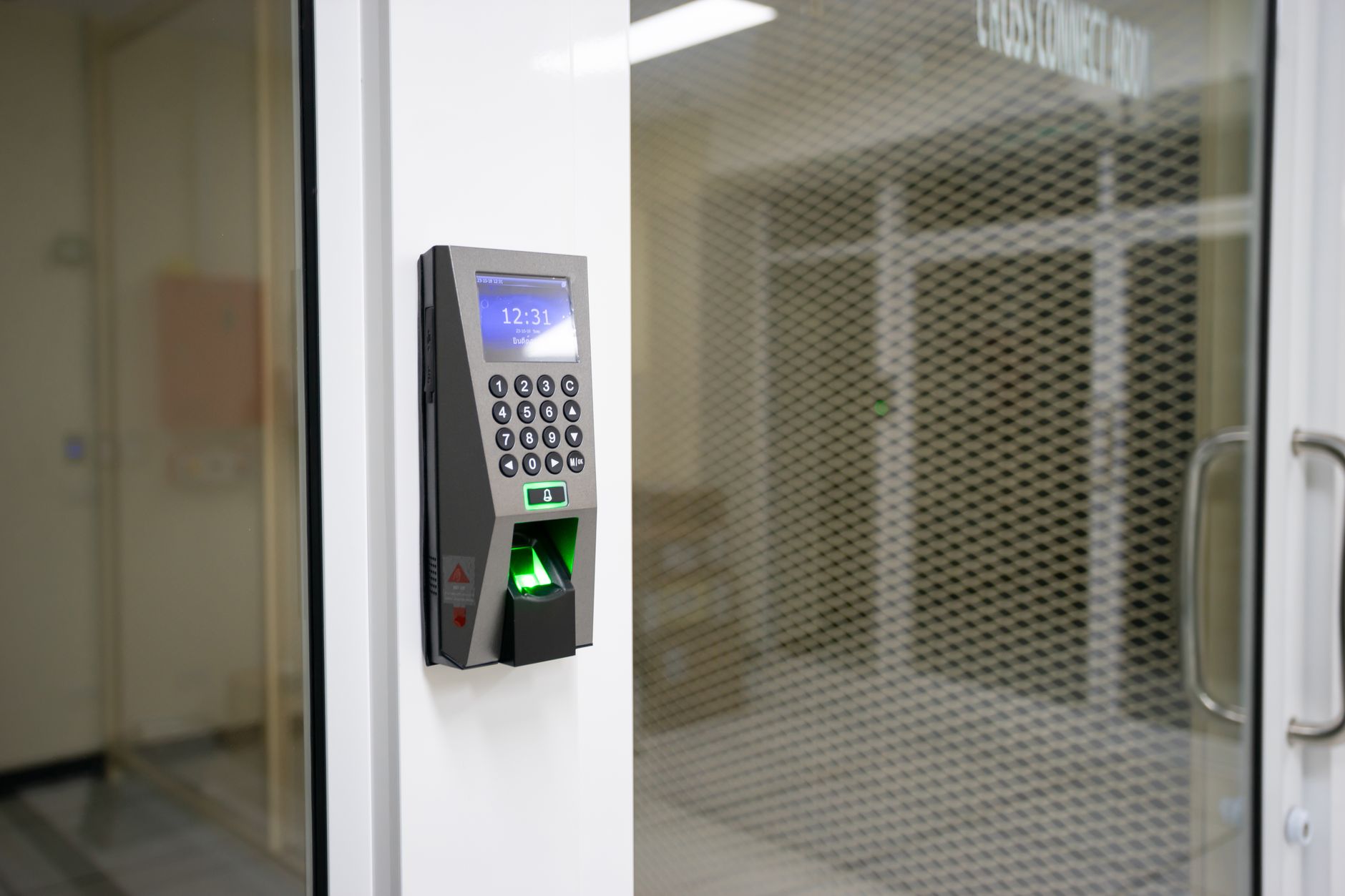 Close-up of a fingerprint biometric scanner used for identity verification