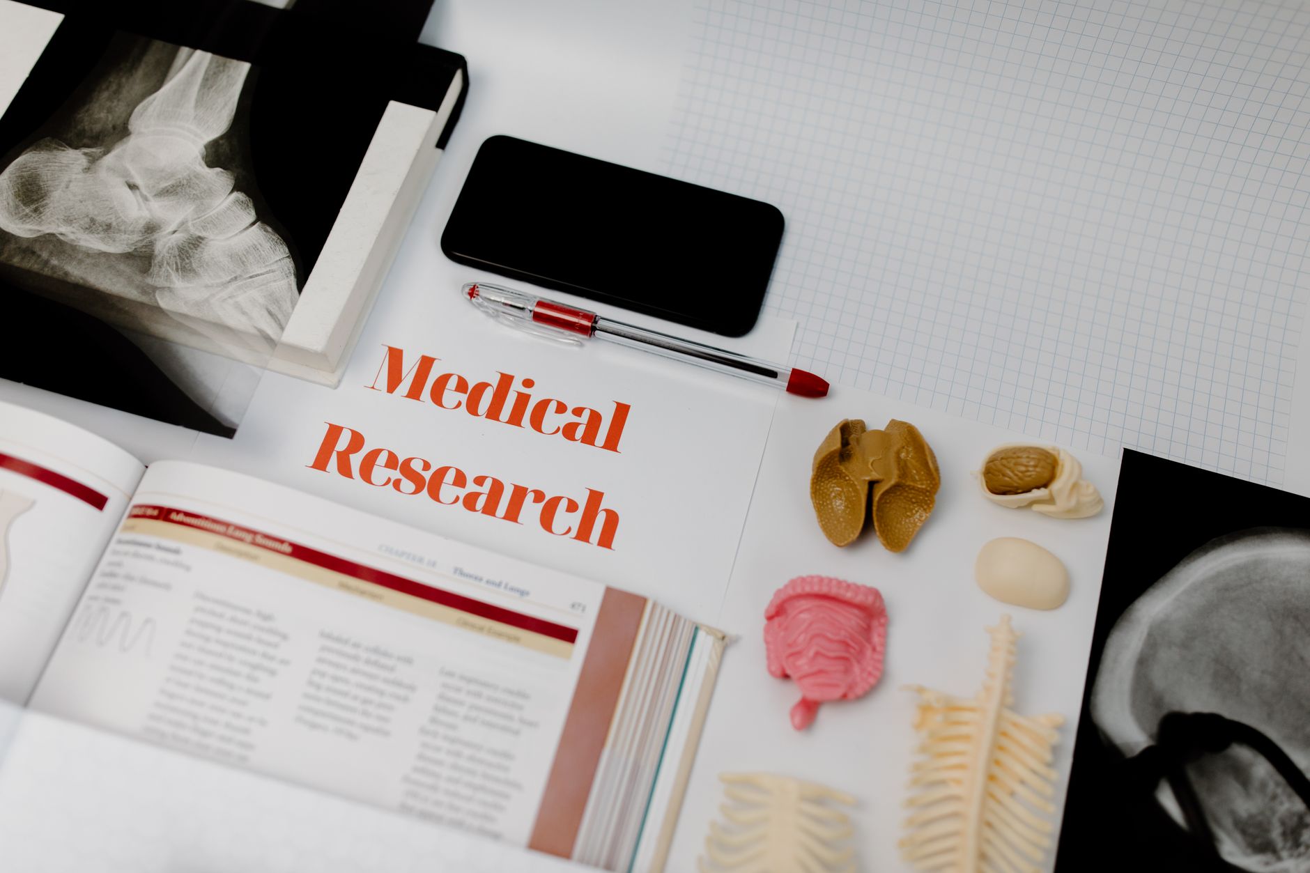 Researcher reviewing clinical data on a computer screen in a medical research setting